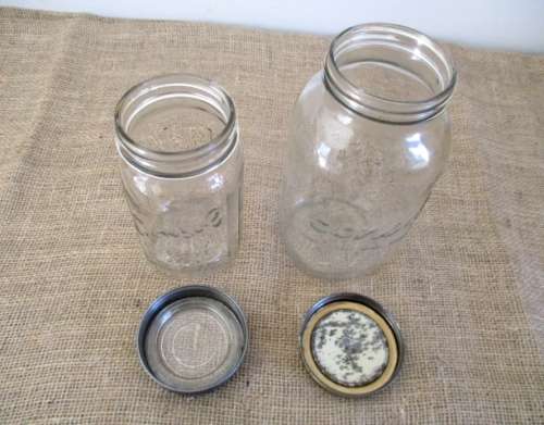 Two Golden Oldies !!!!!  ...Two very old Consol glass preserve jars... One big and one medium size.