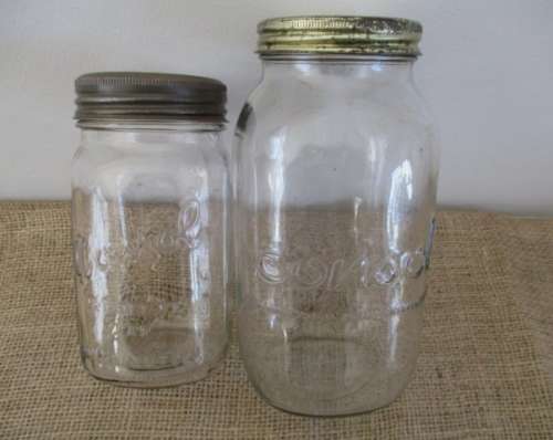Two Golden Oldies !!!!!  ...Two very old Consol glass preserve jars... One big and one medium size.