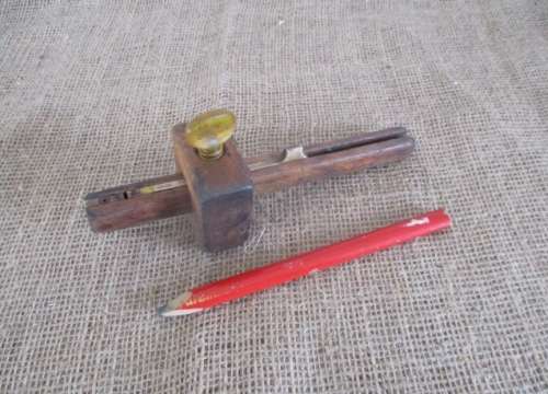 An Antique Wooden Carpenter's Adjustable Scribe With Brass Inlays & Carpenter Pencil