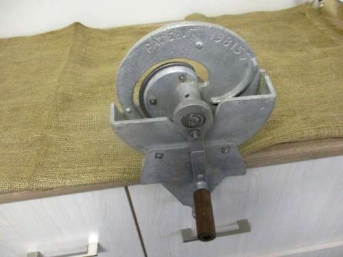 A Handy Cast Aluminum Table Mounted Hand Operated Biltong Slicer