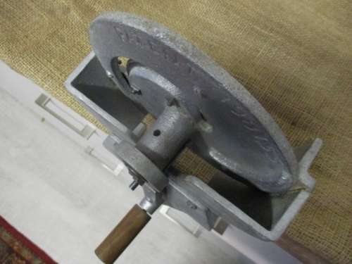 A Handy Cast Aluminum Table Mounted Hand Operated Biltong Slicer