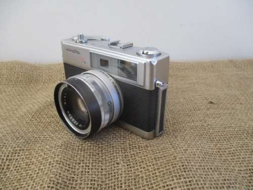 Vintage Minolta Hi-Matic 7s Camera With Minolta Rokkor - PF 1: 1.8 f = 45mm Lens In Pouch