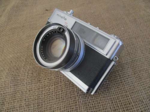 Vintage Minolta Hi-Matic 7s Camera With Minolta Rokkor - PF 1: 1.8 f = 45mm Lens In Pouch