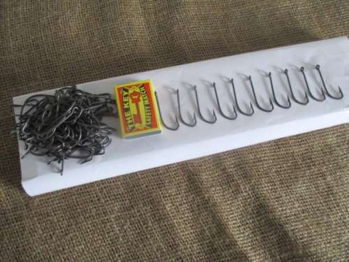 A Lot Fishing Tackle Stuff In Mustad & Son Carton Holder
