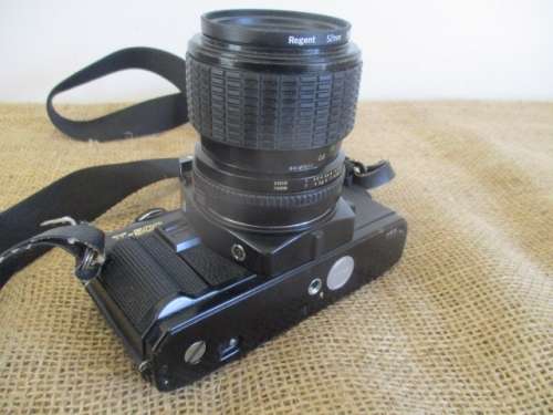 Vintage Black Body Minolta X-500 Camera With Sigma Zoom-Master 35 - 70mm Multi-Coated Lens