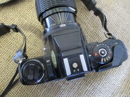 Vintage Black Body Minolta X-500 Camera With Sigma Zoom-Master 35 - 70mm Multi-Coated Lens