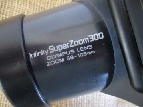 Vintage Olympus Infinity Super Zoom 300 Camera With Olympus Zoom 38 - 105mm Lens In Original Pouch