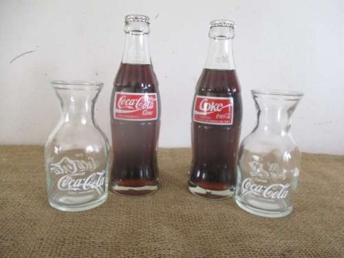 Two Sealed 200ml Coca Cola "Return For Deposit" Bottles And Two Carafies
