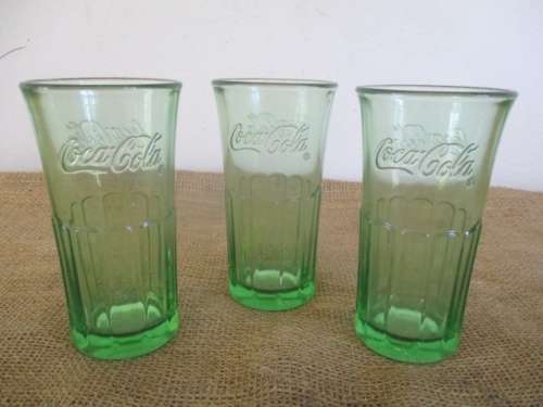 A Collection Of Three Collectable Coca Cola Glass Tumblers