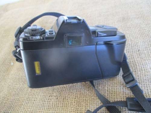 Popular Vintage Minolta X-300s SLR Camera With Film And Attached Minolta MD Zoom 28 - 70 mm Lens
