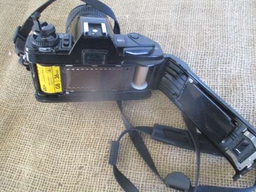 Popular Vintage Minolta X-300s SLR Camera With Film And Attached Minolta MD Zoom 28 - 70 mm Lens