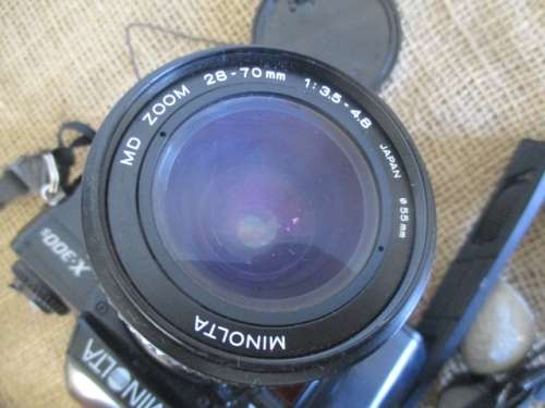 Popular Vintage Minolta X-300s SLR Camera With Film And Attached Minolta MD Zoom 28 - 70 mm Lens