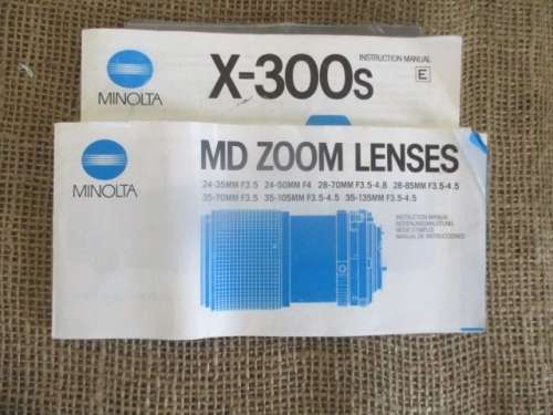 Popular Vintage Minolta X-300s SLR Camera With Film And Attached Minolta MD Zoom 28 - 70 mm Lens