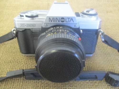 Vintage Minolta X-300 SLF 35mm Camera With Attached Minolta MD  50mm  1: 1.7 Lens Plus Accessories