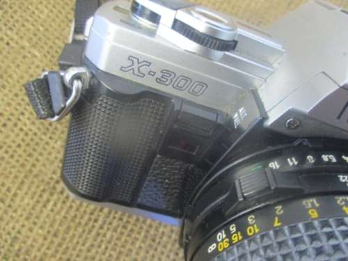Vintage Minolta X-300 SLF 35mm Camera With Attached Minolta MD  50mm  1: 1.7 Lens Plus Accessories