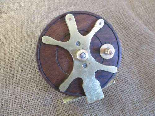 An Outstanding Antique/Vintage 4 1/2" Wooden Fishing Reel Plus One Free Of Charge