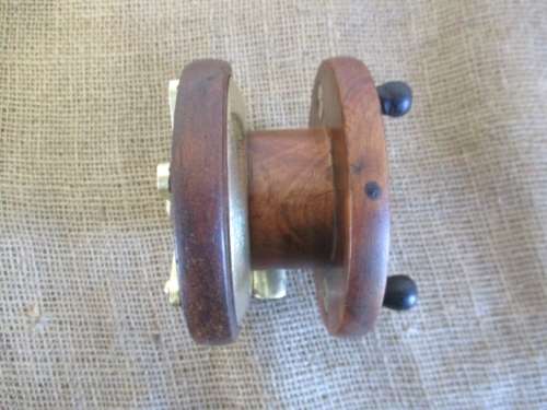 An Outstanding Antique/Vintage 4 1/2" Wooden Fishing Reel Plus One Free Of Charge