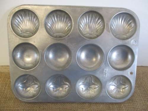 For cen`s bid only - For Real Baking Pleasure..Three Beautiful Vintage Shell & Ivy Leaf Tin Baking