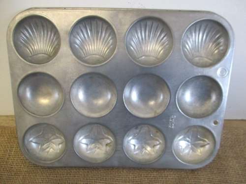 For cen`s bid only - For Real Baking Pleasure..Three Beautiful Vintage Shell & Ivy Leaf Tin Baking