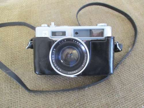 Vintage Yashica Electro 35 35mm SLR Film Camera With Leather Case                 1966