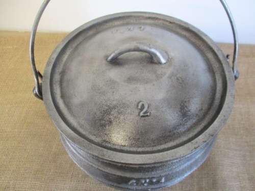 An Excellent Robust And Sizable LK`s #2 3 Legged Solid Cast Iron Potjie Pot