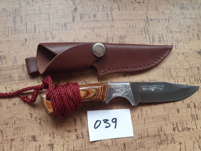Unknown fixed blade with leather sheath
