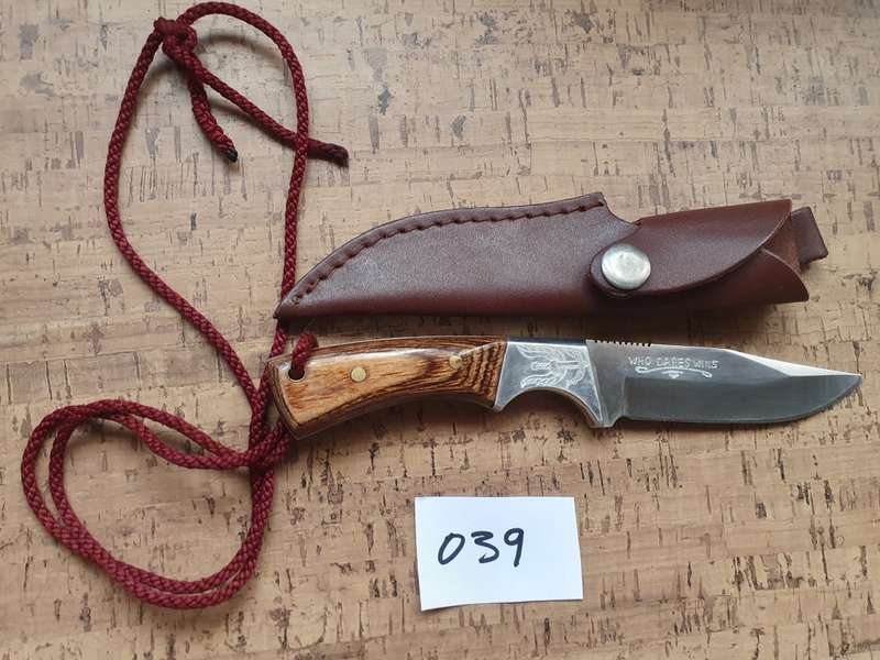 Unknown fixed blade with leather sheath