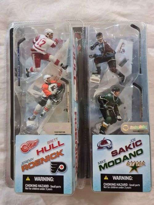 Collectable Baseball and Ice skating figurines