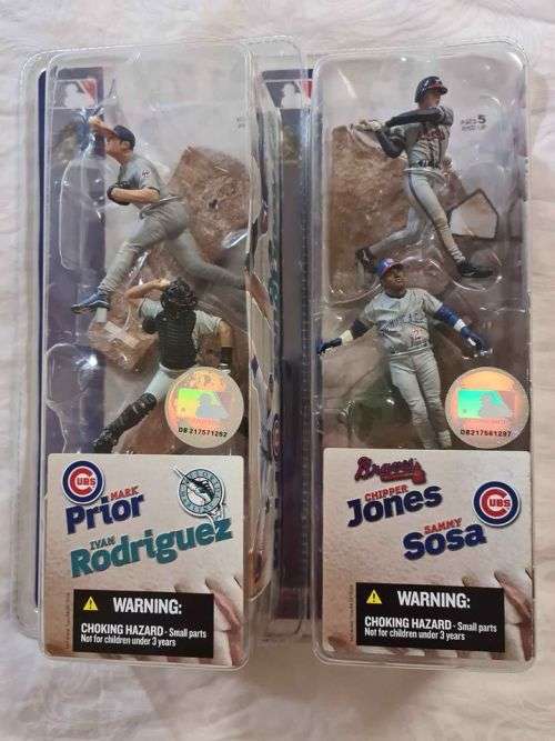 Collectable Baseball and Ice skating figurines