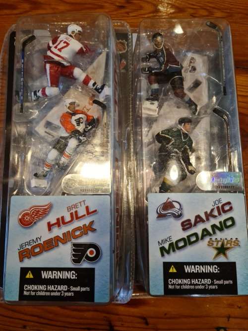 Collectable Baseball and Ice skating figurines