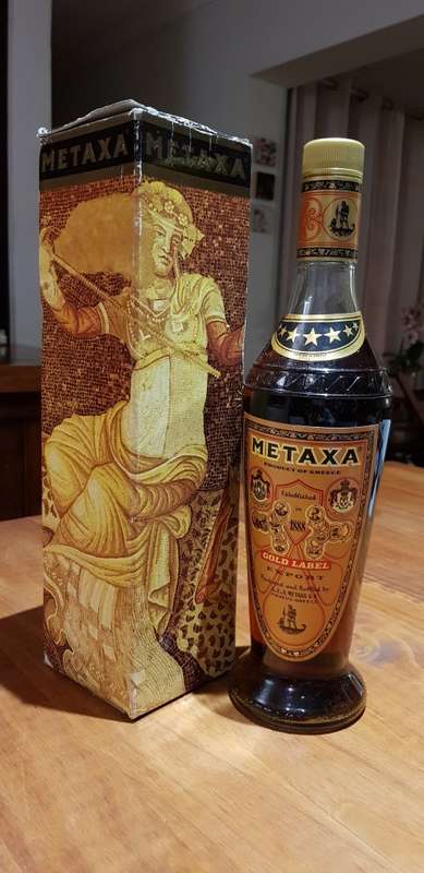 METAXA 7 STAR GOLD LABEL RARE GREEK BRANDY OF THE 1980s - STILL SEALED & IN GIFT BOX.