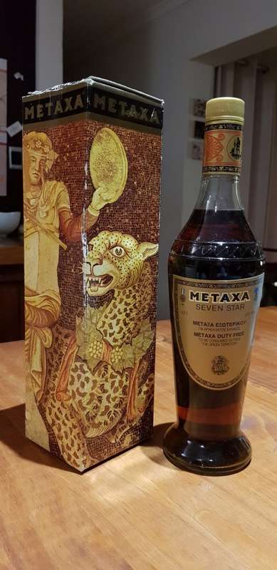 METAXA 7 STAR GOLD LABEL RARE GREEK BRANDY OF THE 1980s - STILL SEALED & IN GIFT BOX.