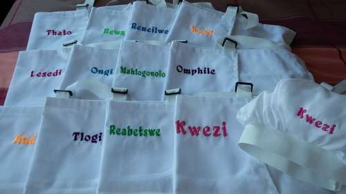 childrens embroidered apron and chefs hat