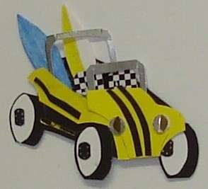 Surfers yellow beach buggy