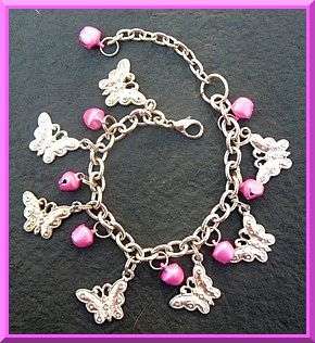 Stunning Butterfly and Pink Bell Charm Bracelet