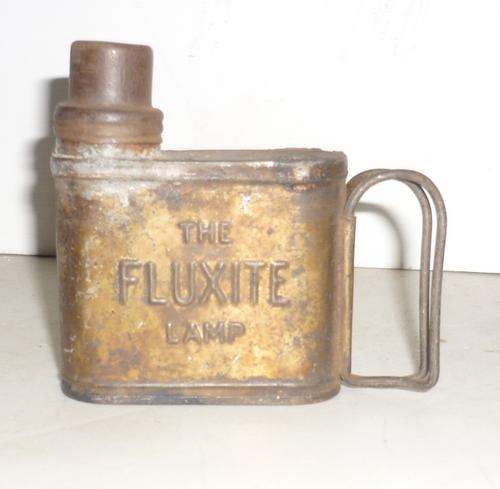 VINTAGE LAMP Fluxite kerosene  made in England. With wick and cap , fold way handles