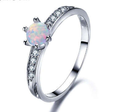 COURIER DELIVERY. Simulated Opal Solitaire with Accents Ring. Size 6-9 available.