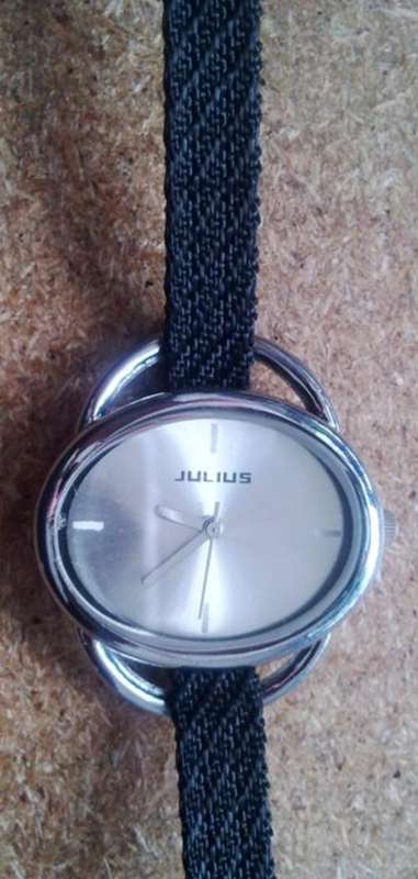Watch with thin black nylon strap