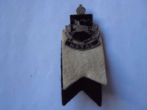 NATAL PIN BADGE