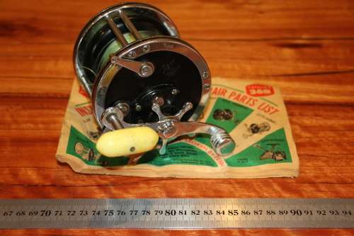 Vintage Penn 49 Fishing Reel (USA) with Catalog