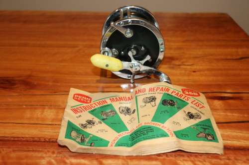 Vintage Penn 49 Fishing Reel (USA) with Catalog