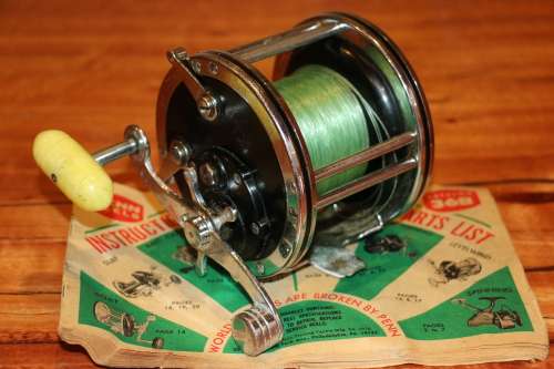 Vintage Penn 49 Fishing Reel (USA) with Catalog