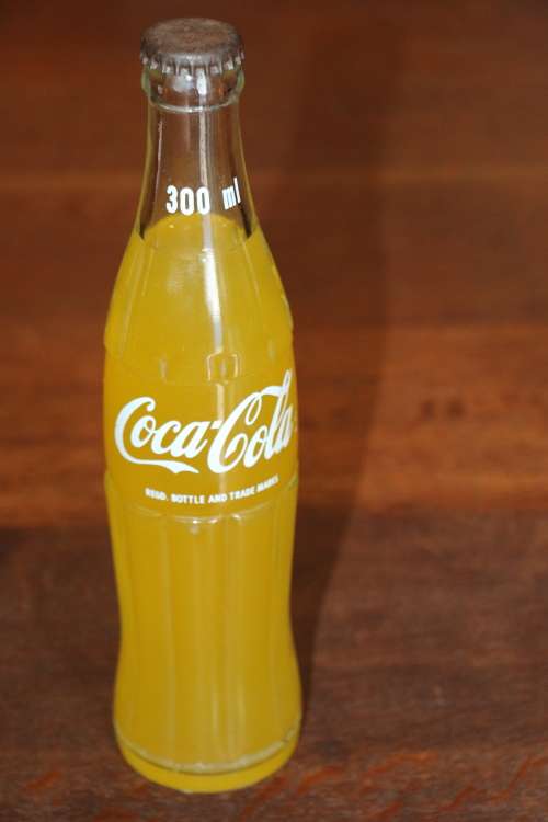 Coca-Cola 300ml bottle filled with Pine Nut