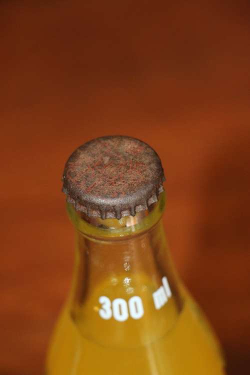 Coca-Cola 300ml bottle filled with Pine Nut