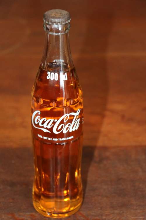 Coca-Cola 300ml bottle filled with Fruti Pine