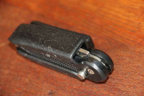 D.O.W. Folding Knife with Belt Holder