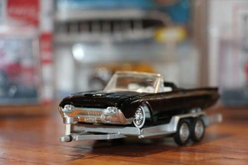 Vintage SOLIDO Diecast Model Car on a Metal Diecast Trailer
