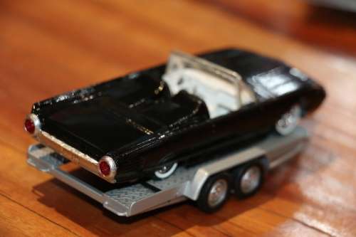 Vintage SOLIDO Diecast Model Car on a Metal Diecast Trailer