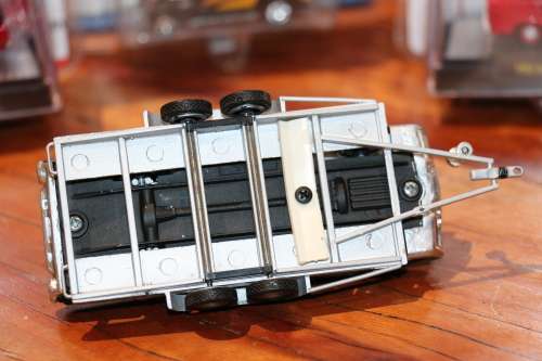 Vintage SOLIDO Diecast Model Car on a Metal Diecast Trailer