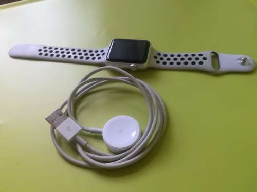 Advanced Series 1 Apple Watch (with white/grey nike strap and charger)